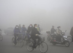 Northern China smog shuts down roads, schools, and airlines. Source: Reuters