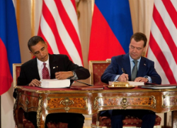 The President signing the Russian Arms Treaty in 2010. Image Source: Wikimedia Commons