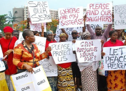Local community protests against the Boko Haram for stealing young school girls. Image Source: BBC/AFP
